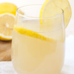 Refreshing Lemon Juice Apple Cider Vinegar and Honey Sparkling Beverage served in a clear glass