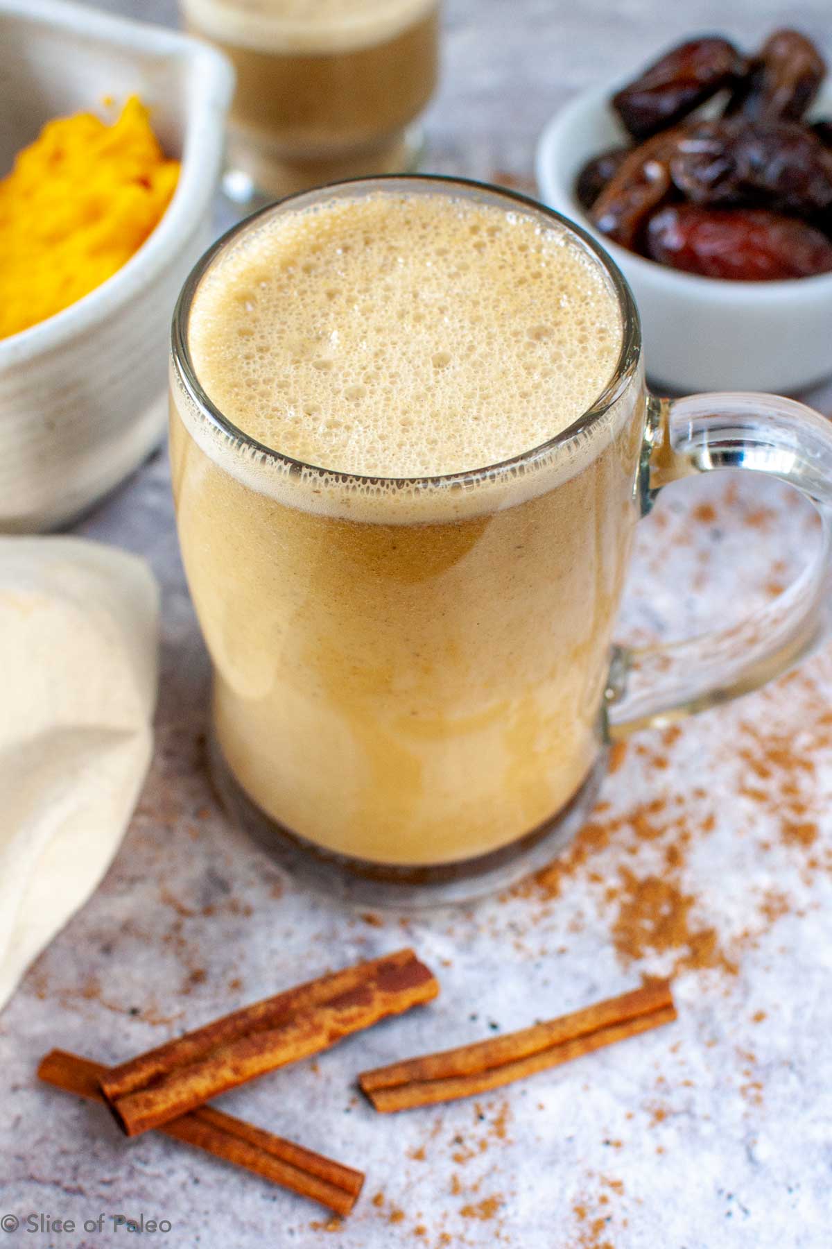Paleo pumpkin spice latte served in a glass mug