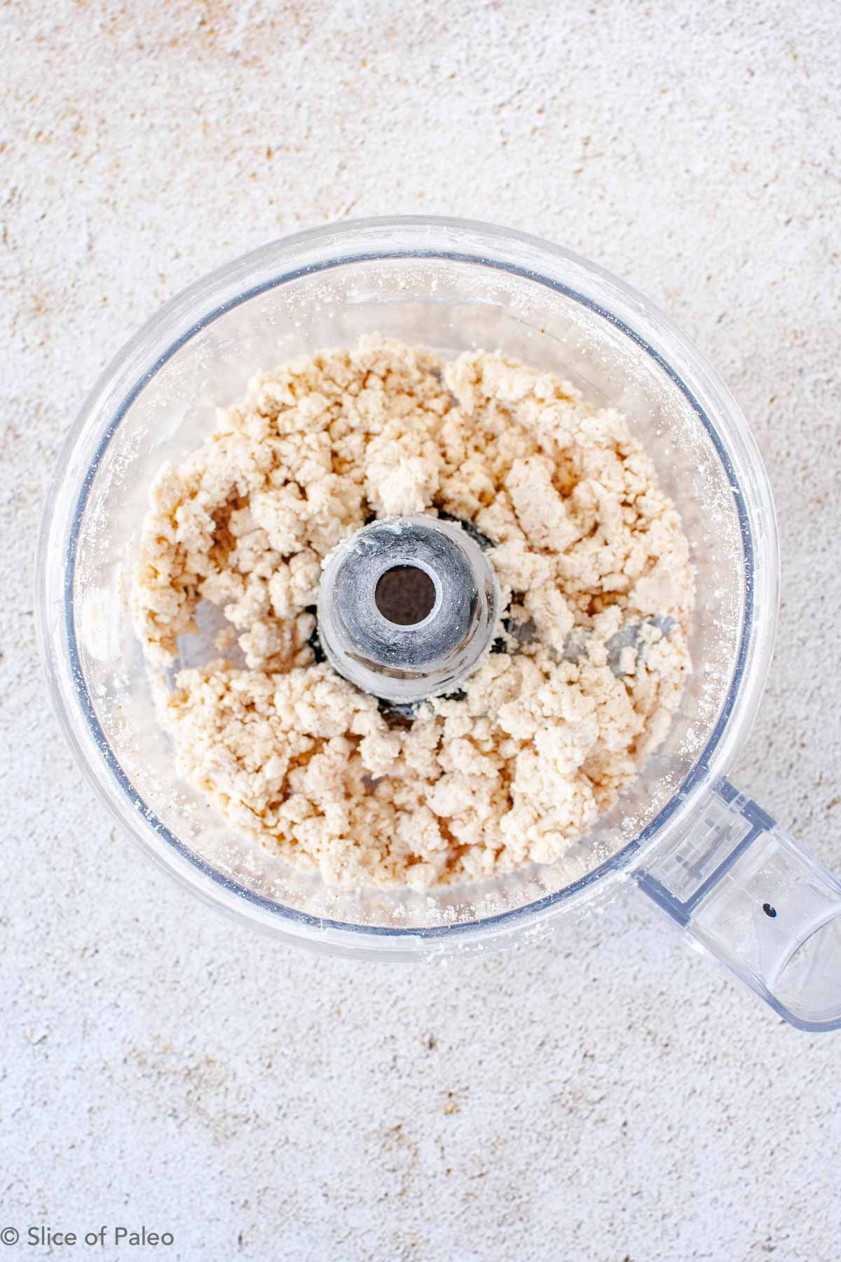 Paleo pie crust flour and shortening in a food processor