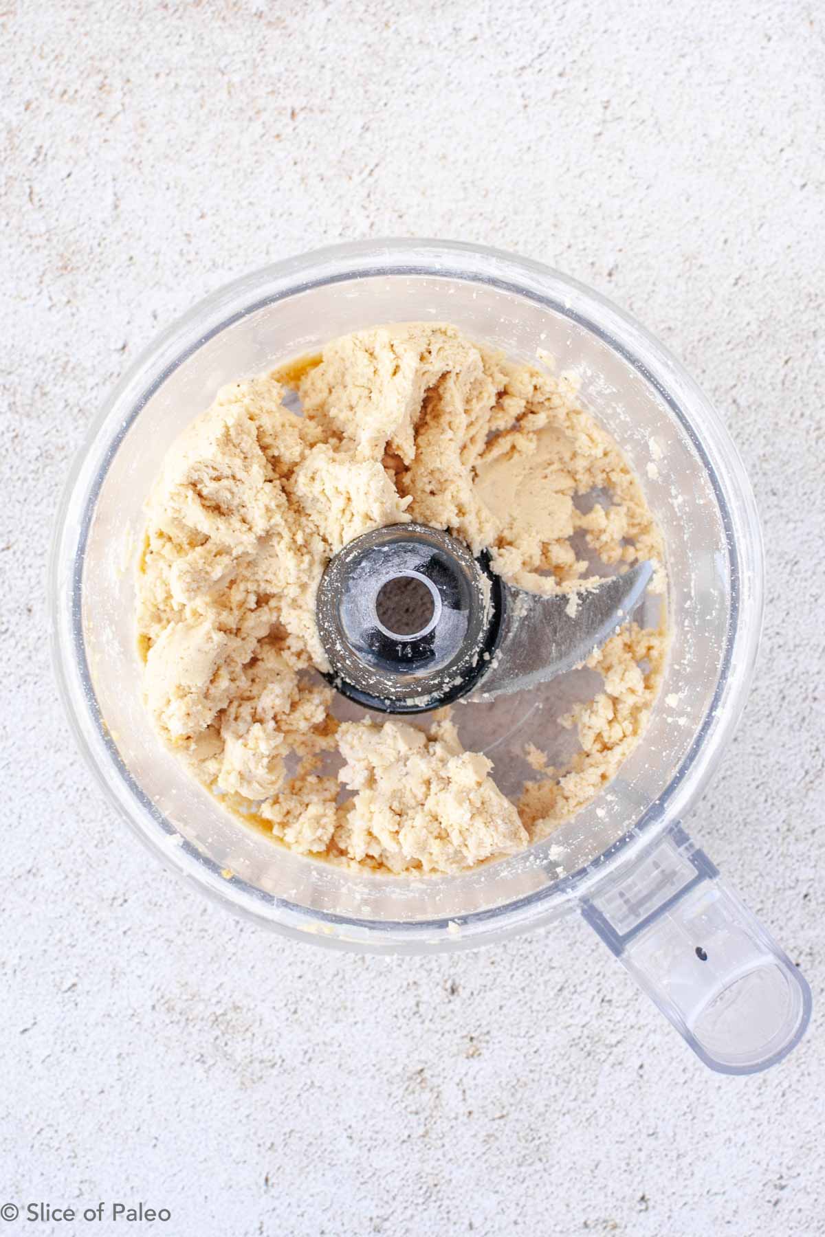 Paleo pie crust flour, shortening and egg in a food processor