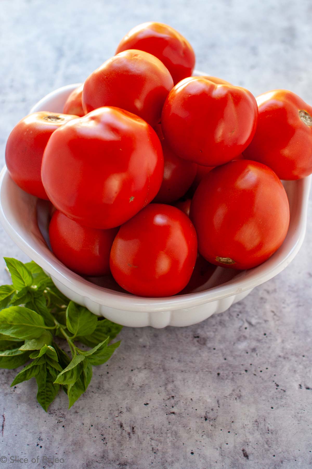 Provencal Tomatoes recipe showing whole fresh tomatoes