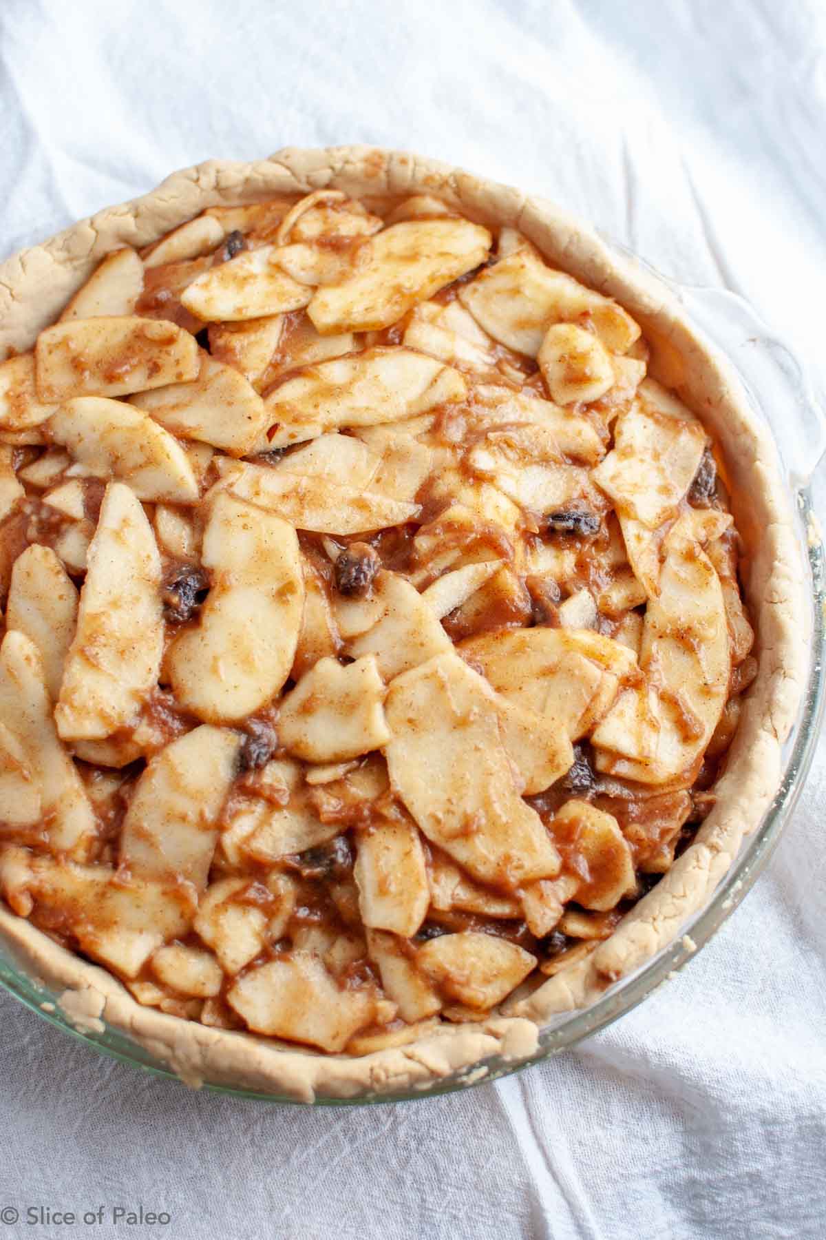 Fruit Sweetened Paleo Apple Pie filling layered in bottom crust