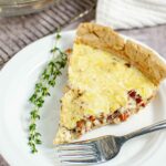Gluten Free Quiche Lorraine with Sheep's Milk Cheese served on a white plate