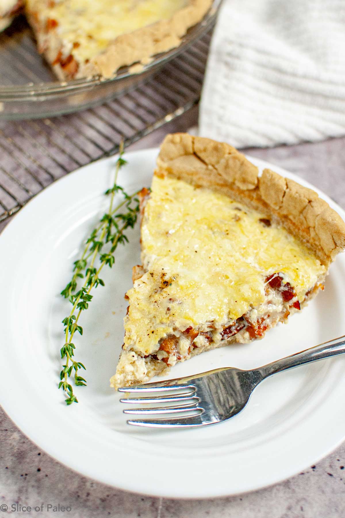 Gluten Free Quiche Lorraine with Sheep's Milk Cheese served on a white plate