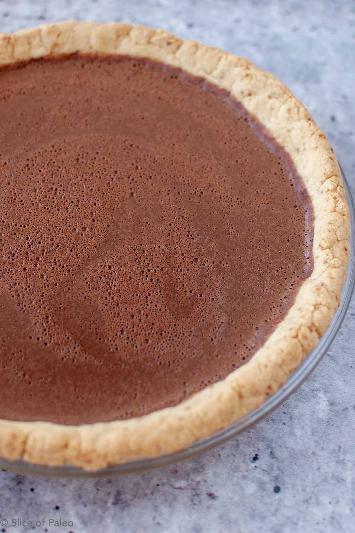Paleo Chocolate Cream Pie chilled in a pie pan