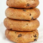Paleo Cinnamon Raisin Bagels stacked on a serving stand