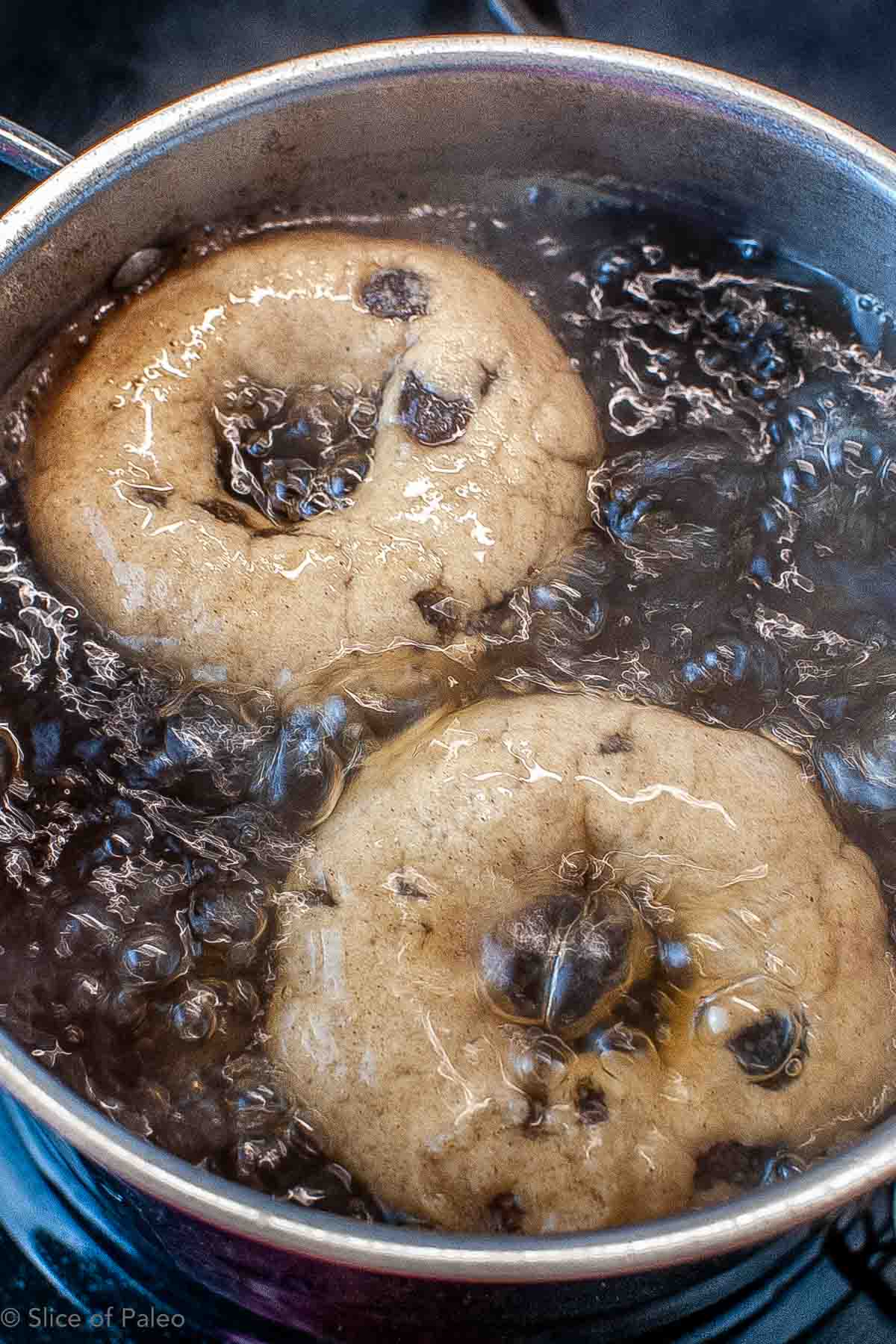 Paleo Cinnamon Raisin Bagels boiling in water