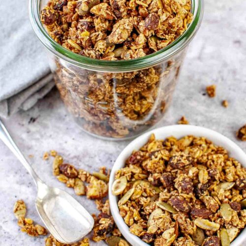 Pumpkin Granola with Maple Syrup in glass containers