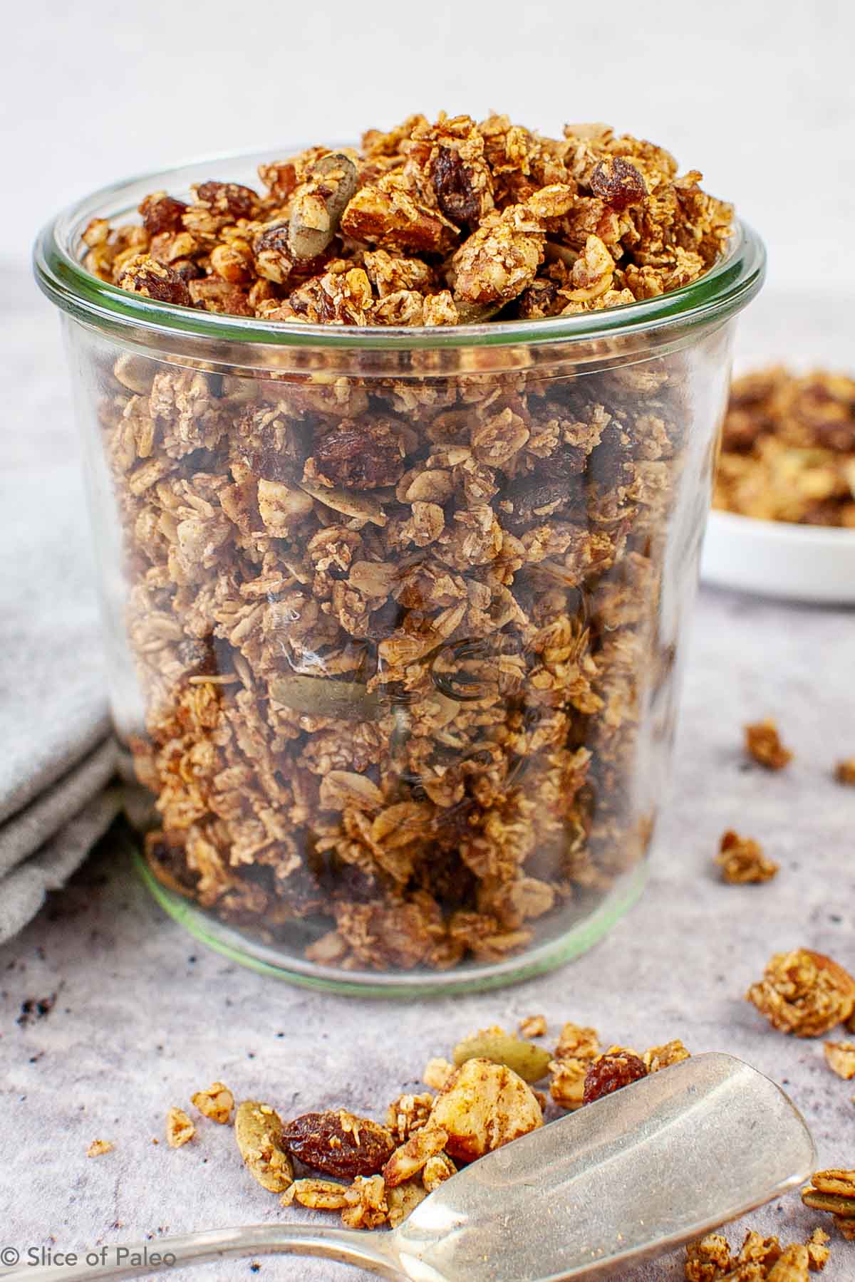 Pumpkin Granola with Maple Syrup stored in a clear jar