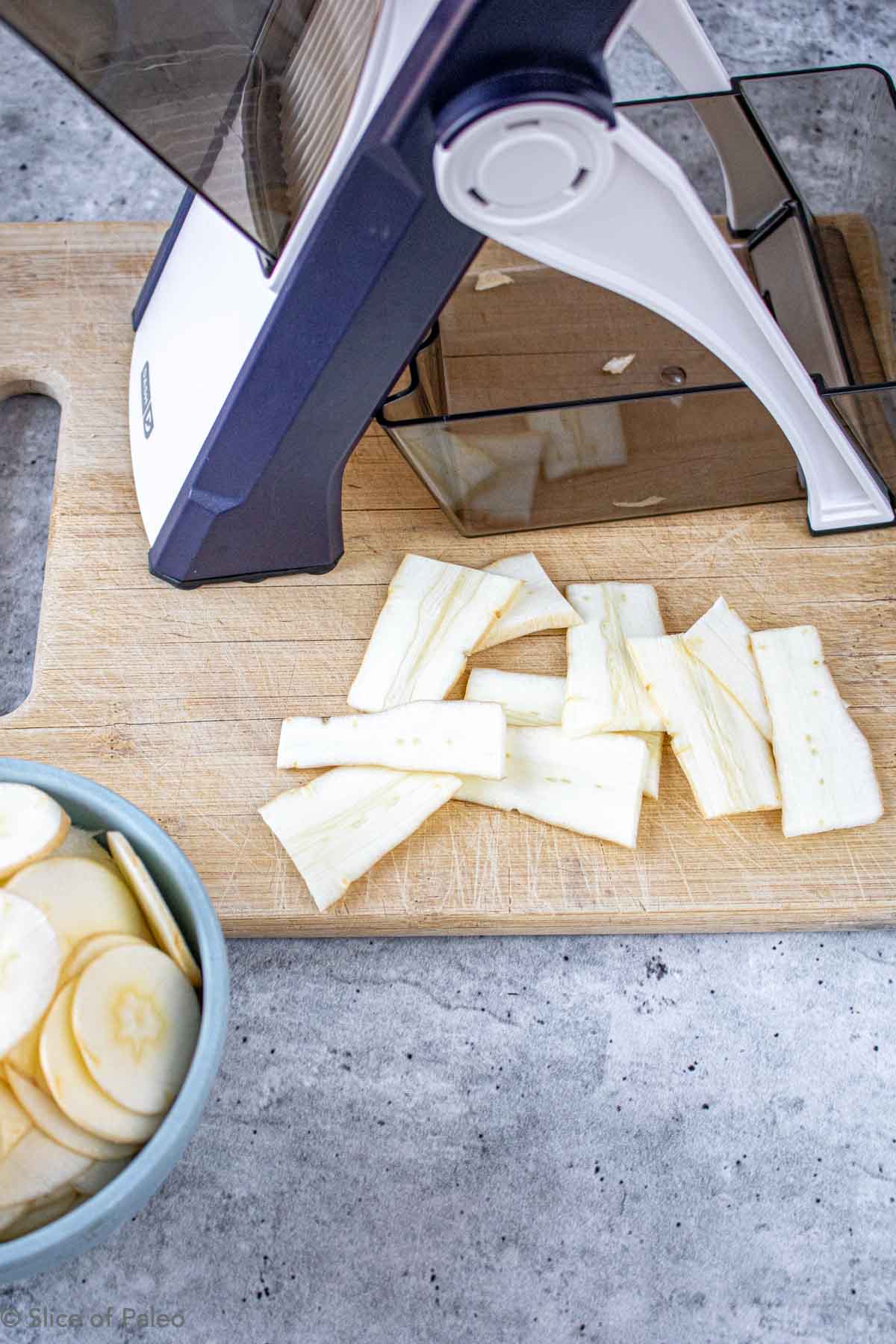 Baked Parsnip Chips being cut