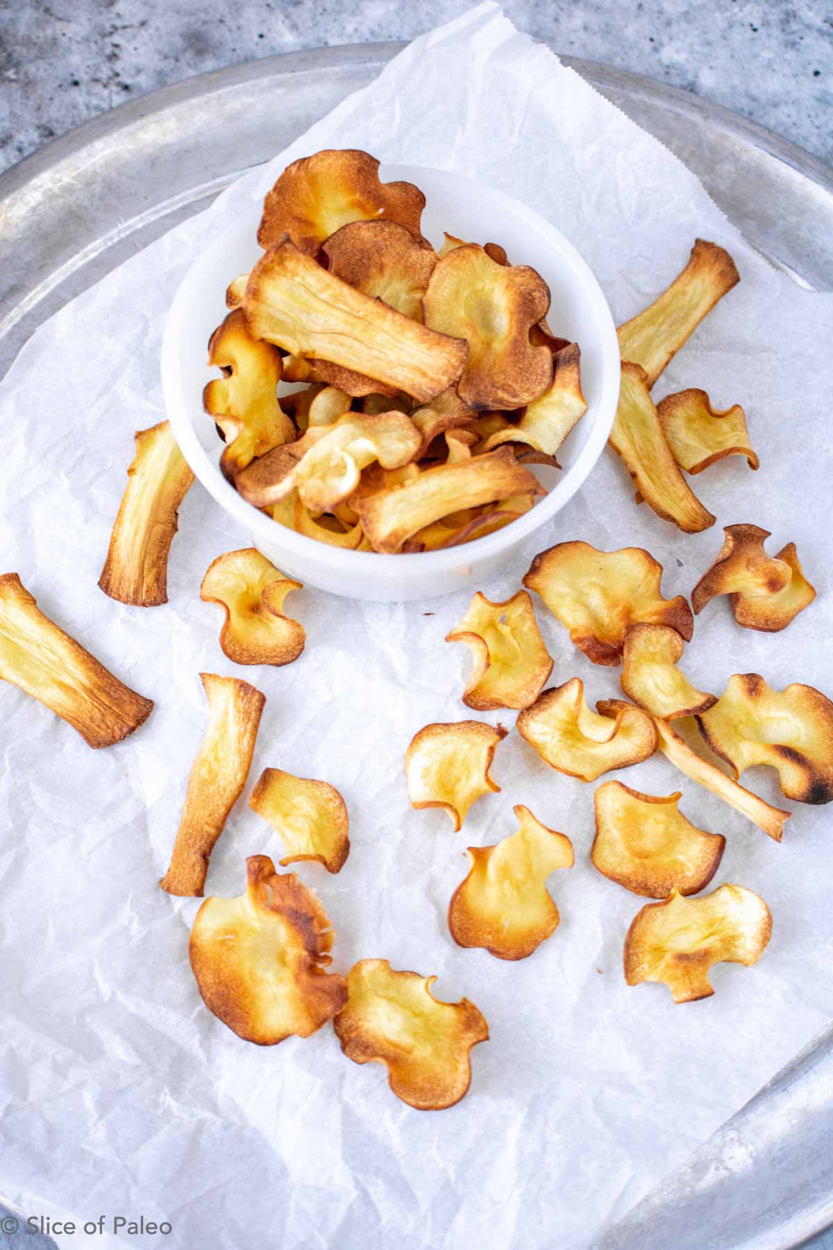 Baked Parsnip Chips ready to eat
