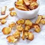 Baked Parsnip Chips served on a tray
