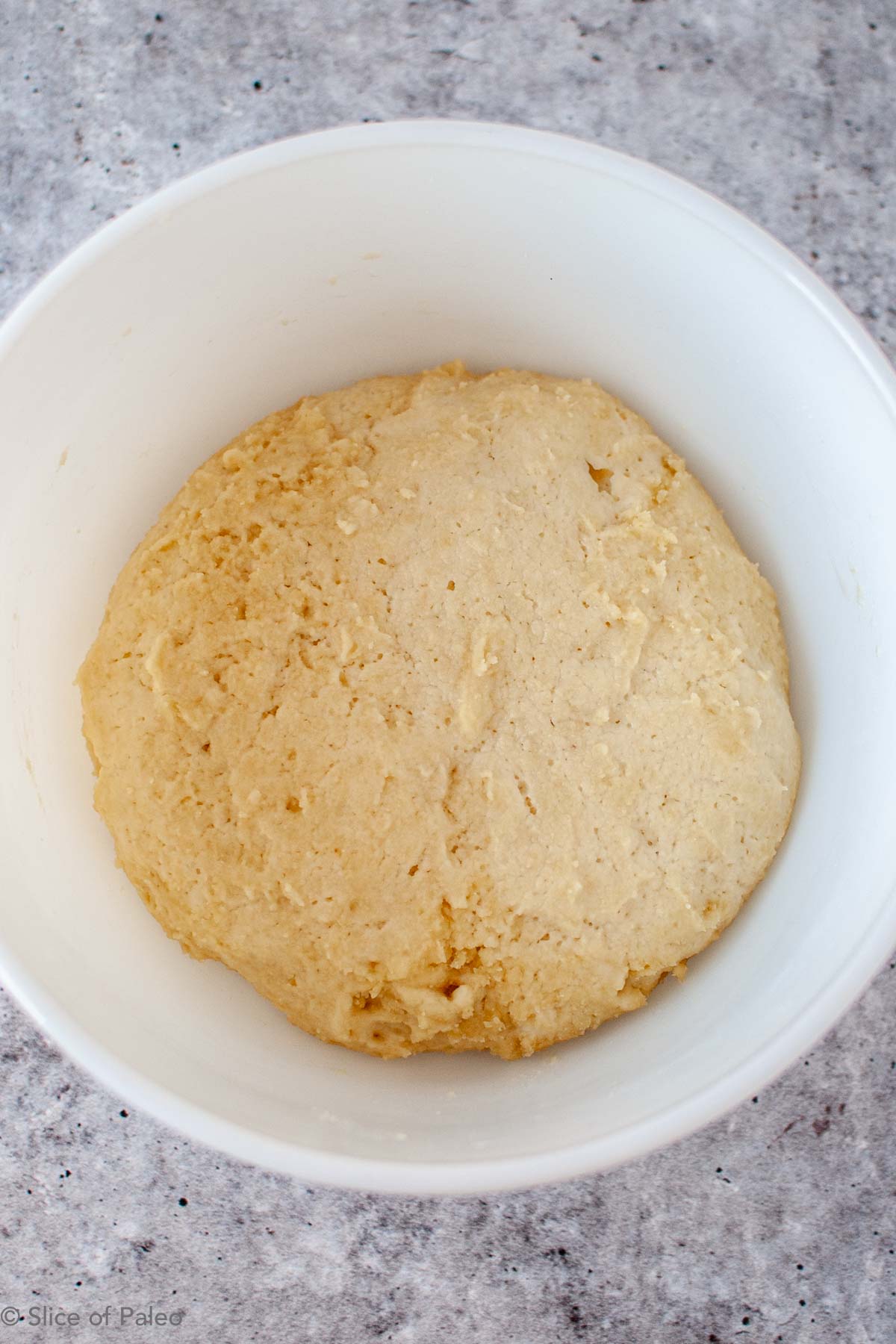 Paleo Chicago Style Deep Dish Pizza dough that has finished rising.